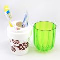 Toothbrush holder with cup